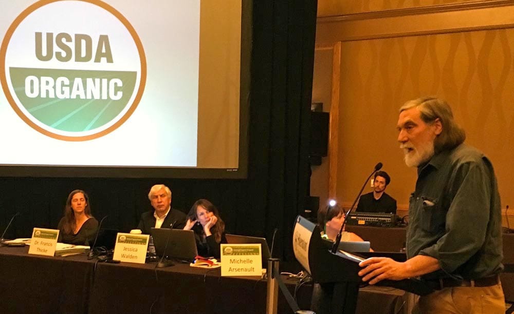 OrganicEye Board President, and pioneering Maine organic farmer, Jim Gerritsen making one of his numerous appearances testifying at a previous NOSB meeting.